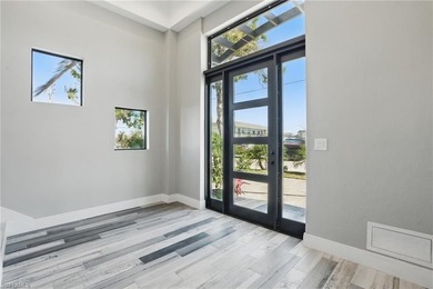 Panoramic Gulf and sand views define this elevated Gulf-front