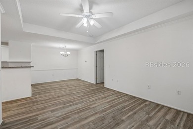 Enjoy wooded views from this second-floor condominium in The - photo 4