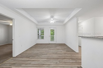 Enjoy wooded views from this second-floor condominium in The - photo 6