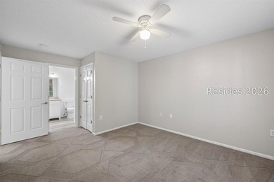 Enjoy wooded views from this second-floor condominium in The - photo 10