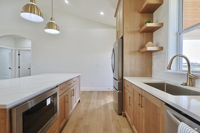 Set on two scenic acres with tranquil pond views, this - photo 11
