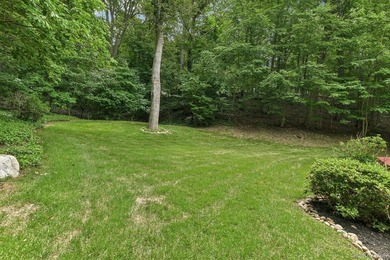 Nestled on a beautifully landscaped cul-de-sac, this - photo 40