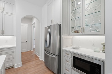 Nestled on a beautifully private homesite in the highly - photo 12