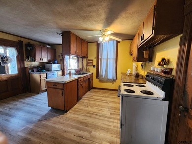 2 Story brick home built in 1898. Eat in Kitchen, Main Floor - photo 2