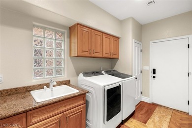 Perfectly positioned on the fairway, this elegant estate offers - photo 34