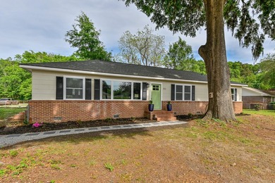 Welcome home to effortless Lowcountry living just outside the - photo 3