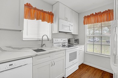 This charming 2 bedroom/2 bath end unit villa is a unique find - photo 11