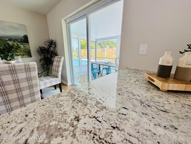 Welcome home. This thoughtfully renovated block pool home rests - photo 20