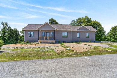 Lake living awaits in this beautiful 2024-built home located - photo 3