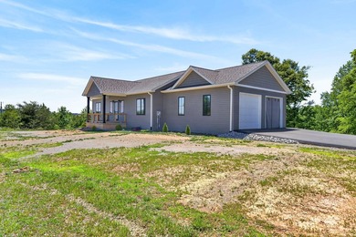 Lake living awaits in this beautiful 2024-built home located - photo 4