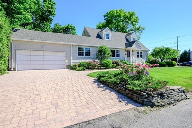 This impeccably maintained expanded Cape Cod offers an abundance - photo 2