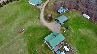 Authentic log cabin retreat on 80 picturesque acres featuring a - photo 9
