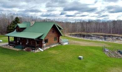 Authentic log cabin retreat on 80 picturesque acres featuring a - photo 10