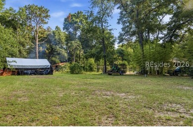 A prepared 1-acre homesite in Beaufort with septic, well, and - photo 5