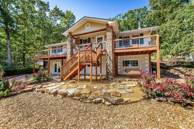 Tucked into a serene, park-like setting, this beautifully - Lake Home For Sale in Fairfield Bay, Arkansas
