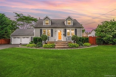 Welcome to this charming Cape-style home nestled on a quiet - photo 1
