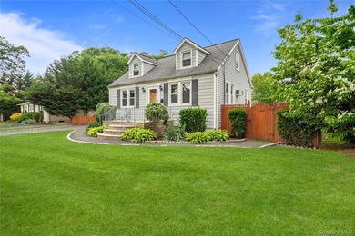Welcome to this charming Cape-style home nestled on a quiet - photo 3
