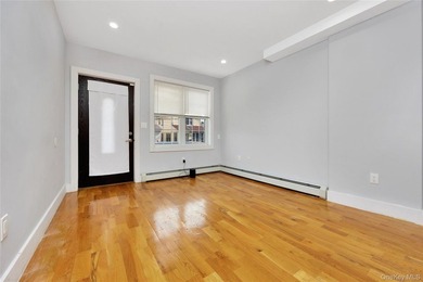 Built in 2021, this legal two-family brick duplex offers a rare - photo 3