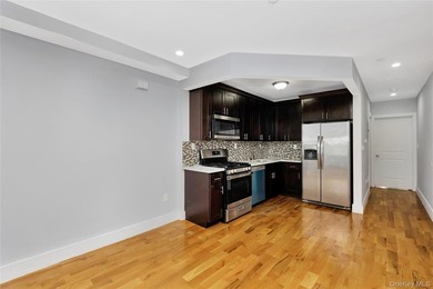 Built in 2021, this legal two-family brick duplex offers a rare - photo 5
