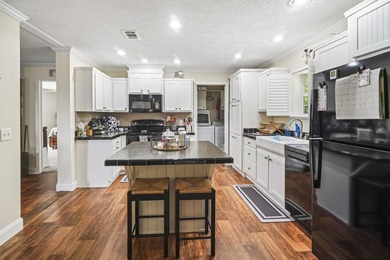Coastal living within minutes to the beach! Built in 2012 this - photo 6