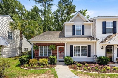Welcome home to this end-unit 3 bed, 2.1 bath townhome in Azalea - photo 1