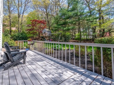 A circular driveway welcomes you to this elegant Colonial set on - photo 7