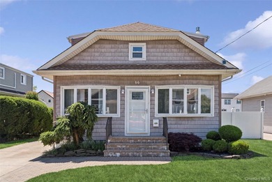Welcome to 66 Kenny Avenue, located in one of Merrick's most - photo 1