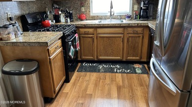 THIS FINE HOME SAYS ''WELCOME'' FROM THE OPEN PORCH INTO THE - photo 16