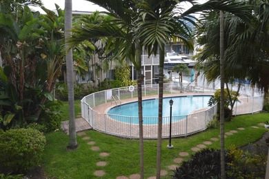 Welcome to Marina del Mar, a charming second-floor condo nestled - photo 1