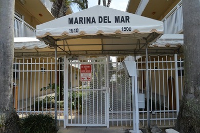Welcome to Marina del Mar, a charming second-floor condo nestled - photo 2