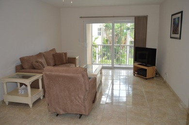 Welcome to Marina del Mar, a charming second-floor condo nestled - photo 9