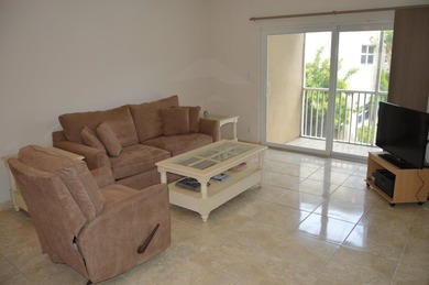 Welcome to Marina del Mar, a charming second-floor condo nestled - photo 10