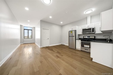 WELCOME TO UNIT 504 AT 714 SENECA AVENUE Pristine top-floor - photo 8