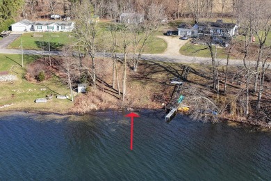 This .4 acre buildable lot includes 30 feet of lake frontage on - photo 3