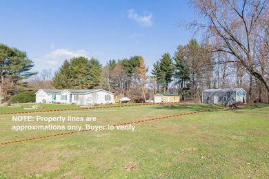 This .4 acre buildable lot includes 30 feet of lake frontage on - photo 5