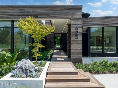 The Cypress House is a rare modern resort estate in Landfall's