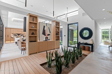 The Cypress House is a rare modern resort estate in Landfall's