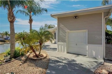 This a 55+ (gated) community. Lovely waterfront 2 bedroom (or - photo 2