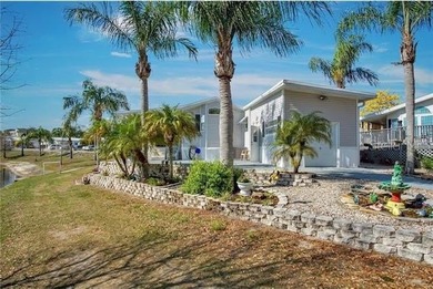 This a 55+ (gated) community. Lovely waterfront 2 bedroom (or - photo 3