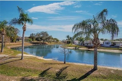 This a 55+ (gated) community. Lovely waterfront 2 bedroom (or - photo 5