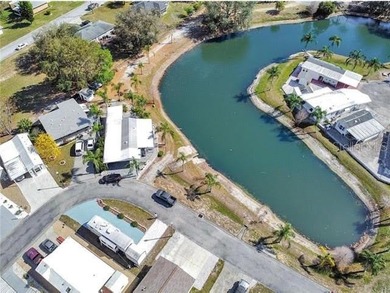 This a 55+ (gated) community. Lovely waterfront 2 bedroom (or - photo 6
