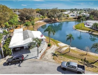 This a 55+ (gated) community. Lovely waterfront 2 bedroom (or - photo 7
