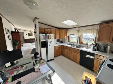 Inviting one-level home situated on a spacious corner lot with a