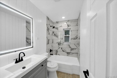 Welcome to 1052 East 227th street! This stunning fully renovated - photo 18