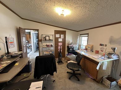 Inviting one-level home situated on a spacious corner lot with a