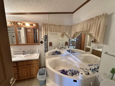 Inviting one-level home situated on a spacious corner lot with a