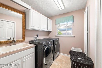 Welcome to this stunning 5-bedroom, 5-bathroom home in the - photo 36