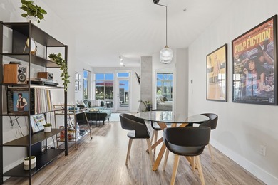 Welcome to Pathways by Adera, a charming concrete low-rise - photo 1