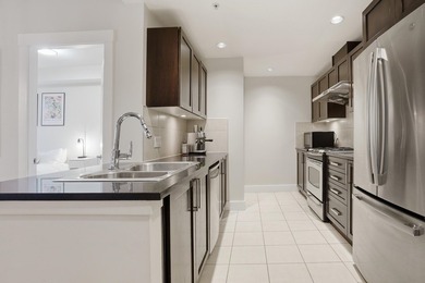 Welcome to Pathways by Adera, a charming concrete low-rise - photo 4