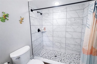 Beautiful lakefront condo in the highly desirable Cinnamon Cove - photo 10